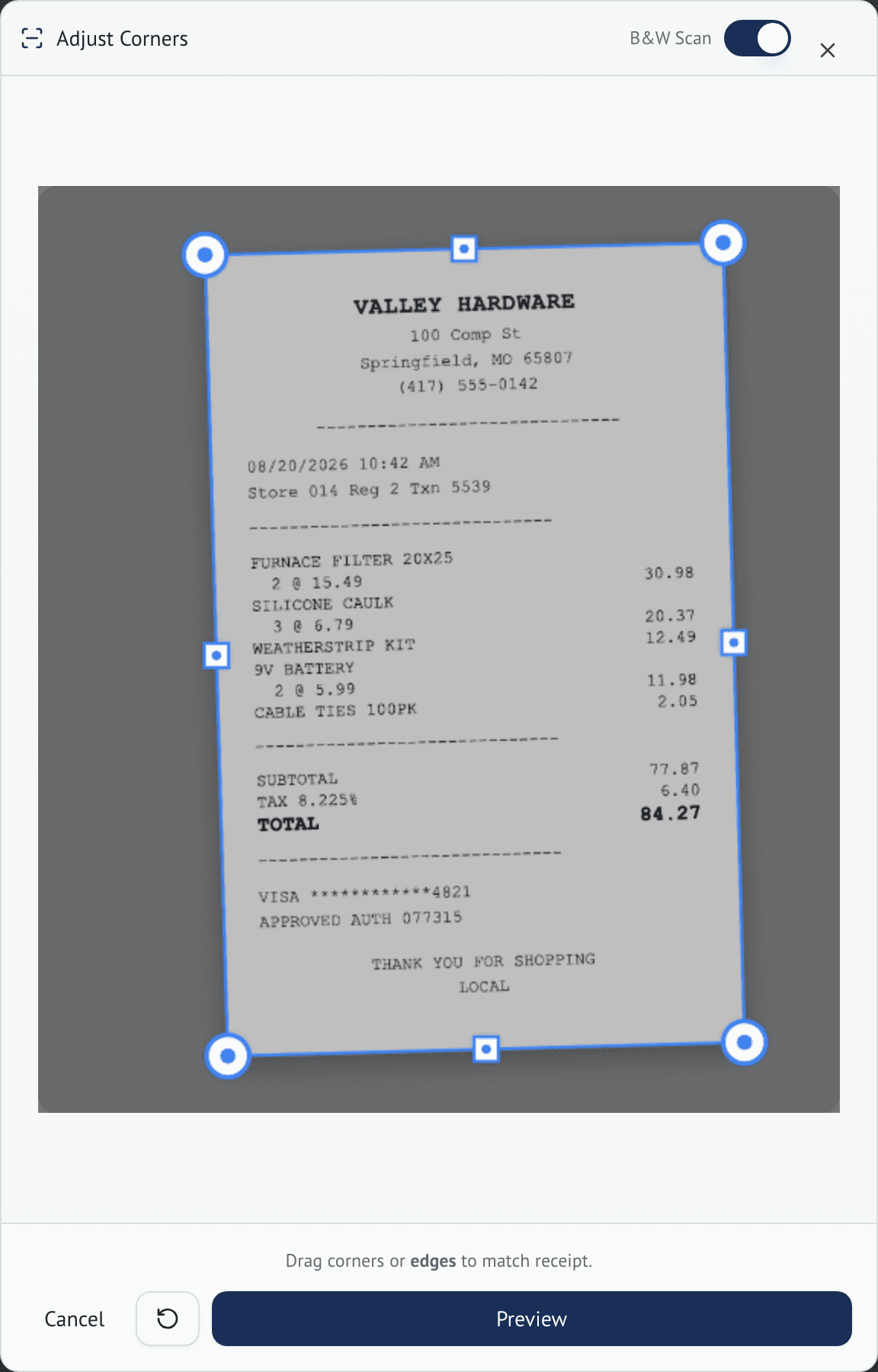 Receipt scanner with corner handles placed on the edges of a photographed hardware store receipt, and a Preview button